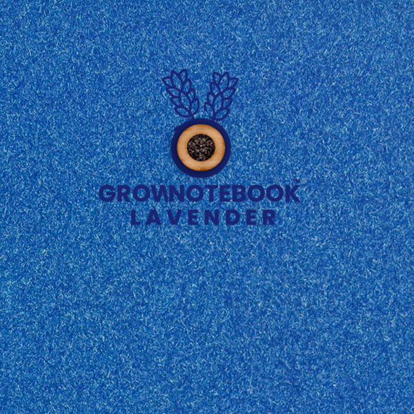 eine Nahaufnahme eines blauen Notizbchs, mit integrierten Lavendelsamen.