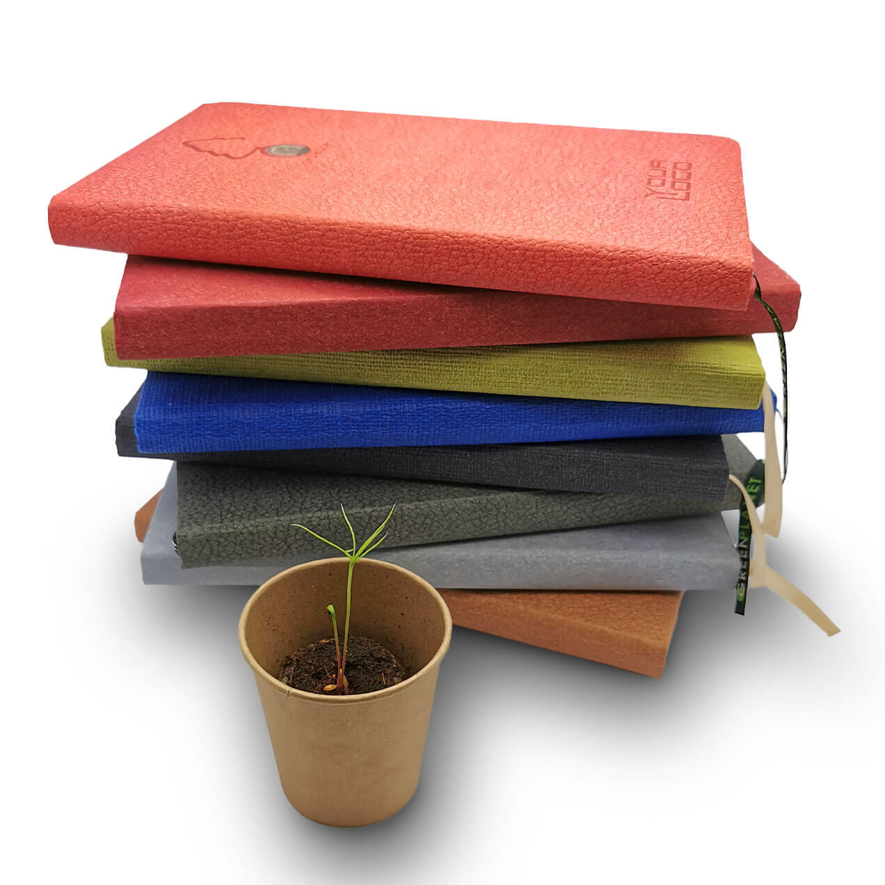 ein Stapel von acht Growbook-Bücher in acht verschiedenen Farben.